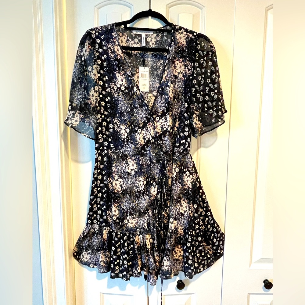 BCBGeneration flutter sleeve wrap dress. Size Medium, new with tags.